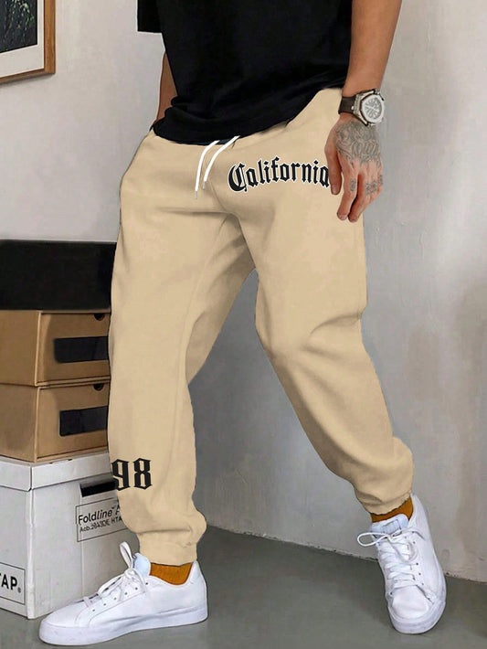 Manfinity Men Letter Graphic Drawstring Waist Sweatpants - Blount ExpressManfinity Men Letter Graphic Drawstring Waist SweatpantsManfinity Men Letter Graphic Drawstring Waist Sweatpants864b5c19-5eb8-47d6-9447-0ee20575c8af